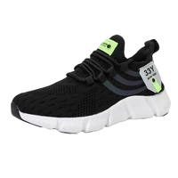 Black knit athletic shoe with white sole.