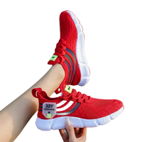 Red athletic shoes.