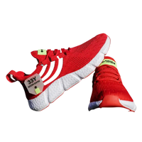 Red athletic shoes with black stripes.