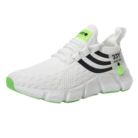 White athletic shoe with black stripes and green accents.