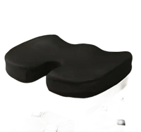 Black orthopedic seat cushion.