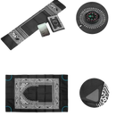 Black prayer mat with compass.