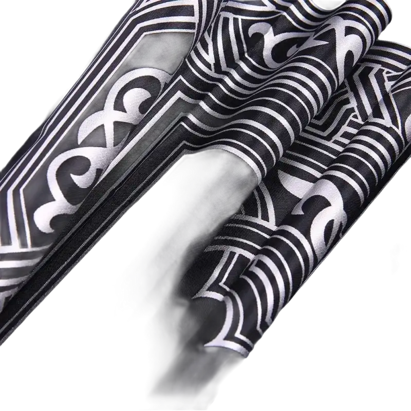 Black fabric with silver art deco pattern.