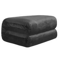 Folded dark gray plush blanket.