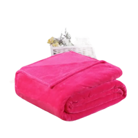 Folded bright pink plush blanket.