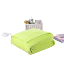 Folded, light green plush blanket.