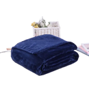 Folded navy blue plush blanket.