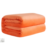 Folded orange blanket.
