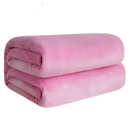 Folded pink plush blanket.