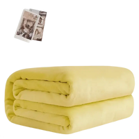 Folded yellow blanket.