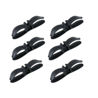 Six black plastic cable clips.