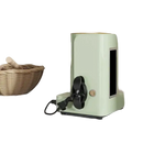 Mint green appliance with cord management.