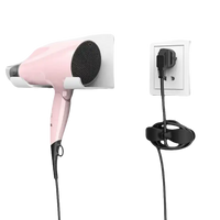 Pink hair dryer with cord management.