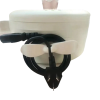 White sterilizer with power cord.