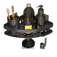 Black corner shower caddy with toiletries.
