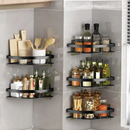 Corner kitchen shelves with various items.
