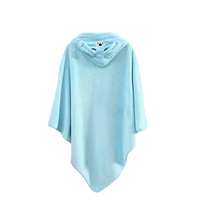 Light blue hooded poncho towel.