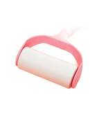 Pink lint roller.
