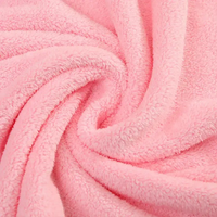 Swirled pink plush fabric.