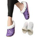Purple clog slippers with white faux fur lining.