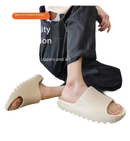 Beige slide sandals.