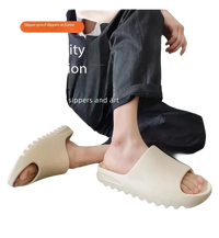 Beige slide sandals.
