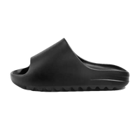 Black slip-on sandal.