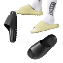 Black and yellow slide sandals.