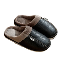 Pair of black leather slippers.