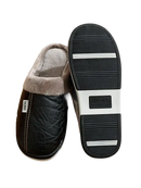 Black faux leather slippers with plush lining.