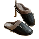Black leather-look slippers with gray faux fur lining.