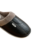 Black leather slipper with gray lining.