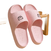 Pair of pink cartoon-themed slides.