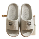Gray bear-themed slide sandals.