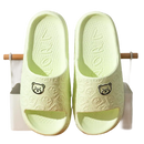 Green bear-themed slide sandals.