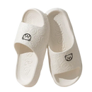 White cartoon-themed slide sandals.