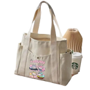 Cream-colored canvas tote bag with cartoon graphic.