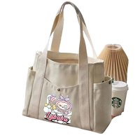 Beige canvas tote bag.