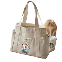 Canvas tote bag with cartoon character.