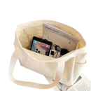 Open white tote bag.