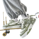 Olive green and white patterned sneakers.