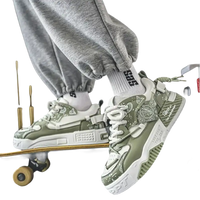 Olive green and white patterned sneakers.