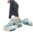 Blue and white patterned sneakers.