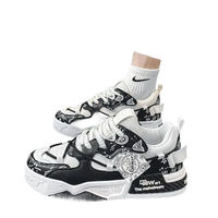 Black and white patterned sneakers.