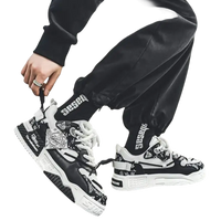 Black and white patterned sneakers.