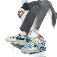Blue and beige chunky sneakers.