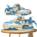 Two blue and white sneakers.