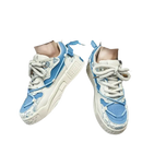 Blue and white patterned sneakers.