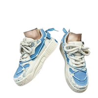 Blue and white patterned sneakers.