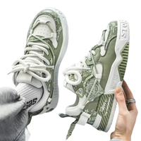 Olive green and white patterned sneakers.